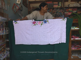 Picb'il huipiles or blouses with added embroidery around the neck are occasionally sold in weaving supply stores in Alta Verapaz, Guatemala.