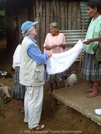 ETD co-founder and videographer Kathleen Mossman Vitale discusses weaving techniques with weavers in Alta Verapaz, Guatemala.