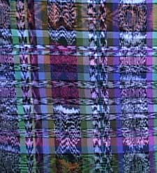 After María Estela's thread bundles are dyed and woven, the jaspe textile looks like this.  Photo by Kathleen Mossman Vitale 2005.