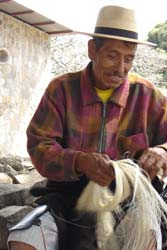 Once the fibers are separated from the leaf by soaking and scraping, they are dried and spun to form cords that can be woven into bags, belts or other utilitarian items.  Photo by Denise Gallinetti 2005.