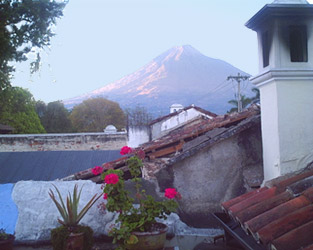 Agua volcano towers over Antigua, a major tourist destination 40 minutes from Guatemala city.  Photo by Kathleen Mossman Vitale 2005.