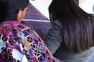 Hand woven huipiles in San Ildefonso Ixtahuacán have extensive supplementary weft brocade designs.  Photo by Kathleen Mossman Vitale 2005.